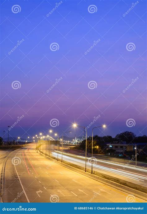 Car Light Trails On Motorway With Beautiful Skyscape At Twilight Stock