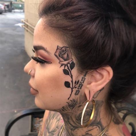 Top Best Face Tattoos For Women Bold Loud Body Art