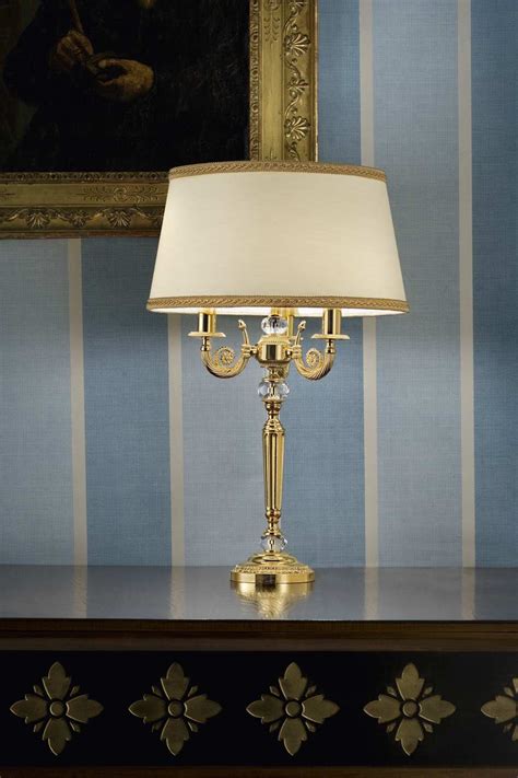 While the combination of matte black metal and mirrored glass reflects a kind of restricted beauty, which is perfect for minimalist, industrial and bohemian home decors. Gold-plated metal table lamp with crystal details | Masiero | Murano and crystal chandeliers ...