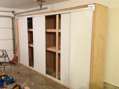Instead of cutting grooves for the door panels i just stapled plastic corner guards (two 90 degree guards to make a channel) on the top and bottom of the frame. Anthony Valentino: DIY Garage Storage with Sliding Doors