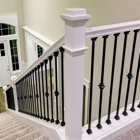 Satin black & brushed nickle metal stair handrail brackets. Black Metal Spindles | Stair Designs