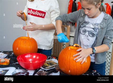 Kids Carving Pumpkins Halloween Trick Or Treat Dubin Irelnad Stock