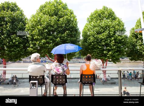 People Seated On A Balcony At The Royal Festival Hall Looking Out Over