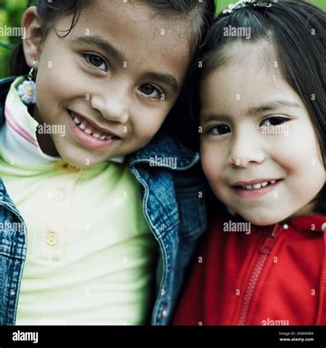 Portrait Of Two Girls Smiling Stock Photo Alamy