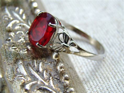 #sterling ruby #art #artist #sculpture #red uniform #sculptor #sculpture by sterling ruby #red uniform sculpture by sterling ruby. Ring Red Ruby Gem Sterling Silver. $22.00, via Etsy. (With ...