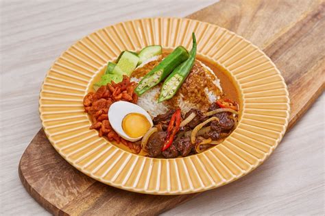Ipoh has a famous nasi kandar stall in yong suan coffee shop which is so addictive that its fans called it nasi ganja or rice with cannabis. Eat Drink KL: Mr Nasey: Nasi Ganja & Ipoh Mali Meal Deliveries