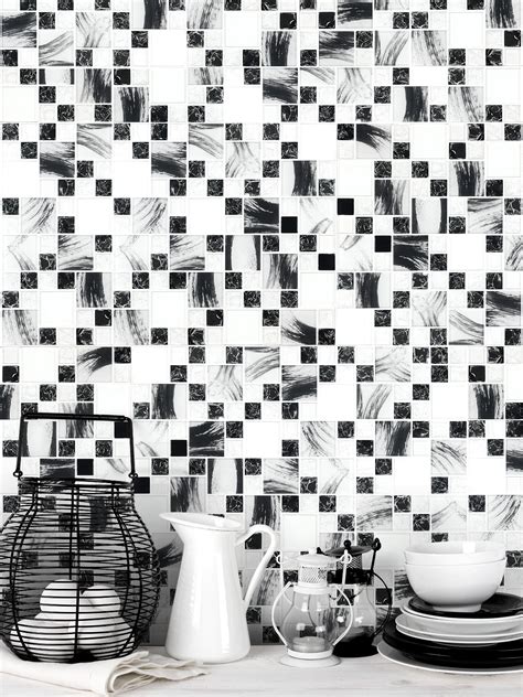 Glass backsplash tiles might seem like an unusual choice for a kitchen area, but they are actually quite popular amongst people who spend a lot of consider installing a pale green glass tile backsplash in a classic kitchen that boasts simple white wood cabinetry and crisp white marble countertops. Black & White Color Glass Mosaic Backsplash Tile ...
