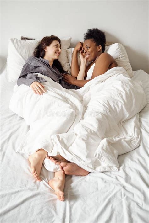 Lesbian Couple Relaxing In Bed Under Blanket Stock Image Image Of Looking Caucasian 224867921