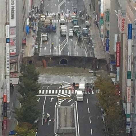 Huge Sinkhole Swallows Up Road In Fukuoka Japan In Pictures And Videos Strange Sounds