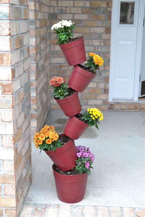 Label instructions suggest using the product after ornamental flowers, grasses and shrubs are at least 3 inches in height. my topsy turvy flower pot | Things I have made | Pinterest ...