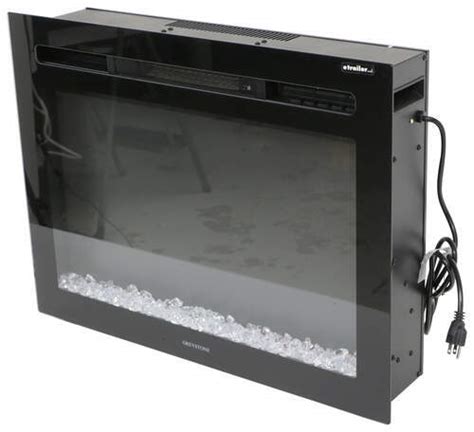 This electric fireplace features crystals that emit blue light for a relaxing effect. Greystone 26" Electric Fireplace with Crystals - Recessed ...