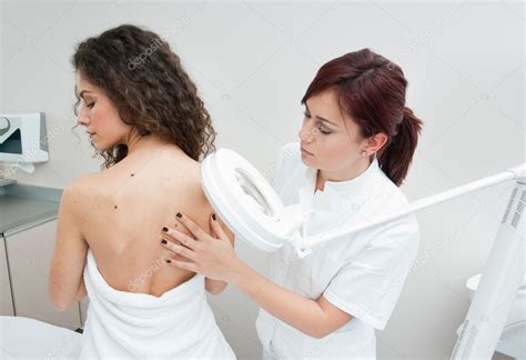 Woman At Dermatology Examination — Stock Photo © Bertys30 25385217