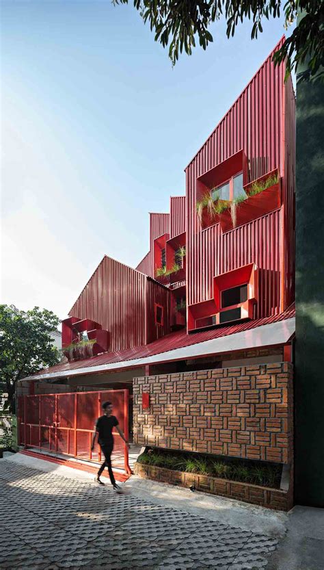 Desain Rumah Kos Super Unik Dengan Warna Merah Menyala Arsitag