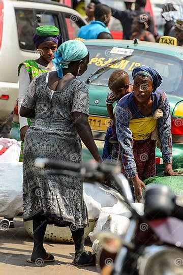 Unidentified Ghanaian Woman Bends Down To Pick Up Something At Editorial Stock Image Image Of