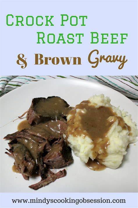 Savory roast beef with tender carrots and potatoes is a classic meal all done in the slow cooker! Crock Pot Roast Beef & Brown Gravy | Mindy's Cooking Obsession