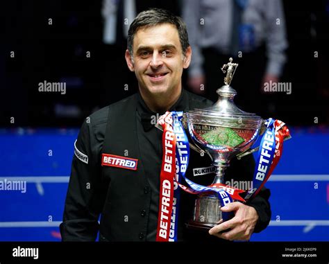 Ronnie Osullivan Celebrates With The Trophy During Day Seventeen Of The Betfred World Snooker