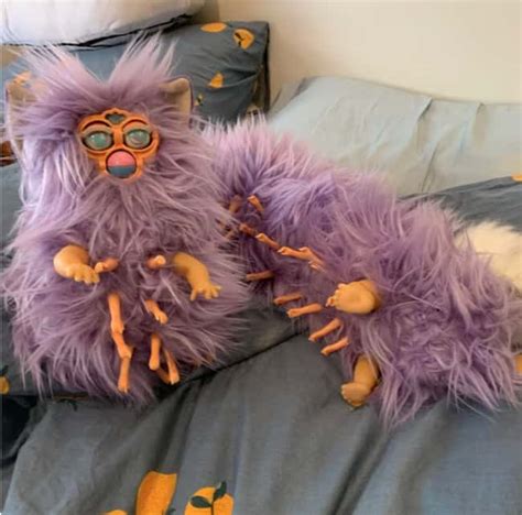 16 Creepy Pictures Of Long Furby Toys