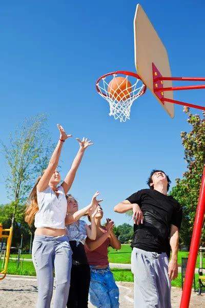 Teenagers Playing Basketball — Stock Photo © Anatols 8692340