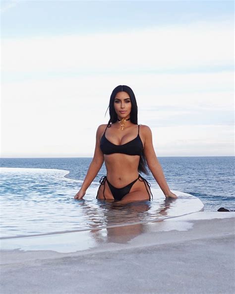 kim kardashian shares sexy swimsuit photos shot by kanye west on valentine s day trip