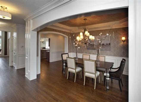 This room shows an almost perfectly matched width for crown moldings and baseboards. Custom Decorative Archways by 3 Pillar Homes. Formal ...