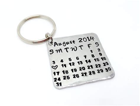 Maybe you would like to learn more about one of these? 1st anniversary gift - calendar page keyring ...