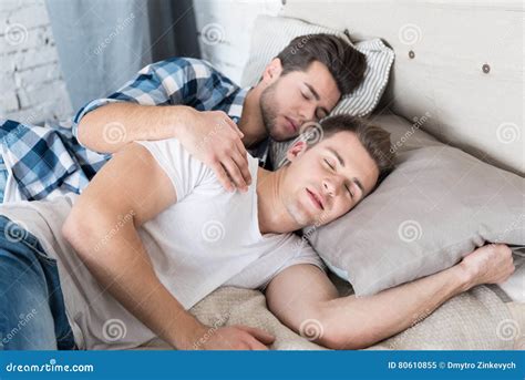 Cute Gay Couple Sleeping Together In Bed Royalty Free Stock Photo