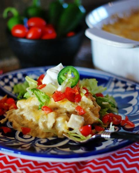 This easy layered green chile chicken enchilada casserole. Green Chile Chicken Enchilada Casserole | a southern discourse