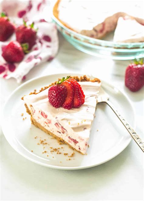 no bake strawberry cream pie is super fluffy filled with fresh strawberries and is served