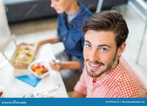 Portrait Of Happy Male Executive Having Breakfast Stock Photo Image