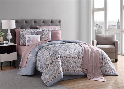 I think your room needs a softer color to offset the dark couch and furniture. Essential Home 12pc. Comforter Set - Gray and Blush Paisley