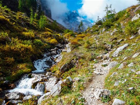 Austria Austrian Dolomites Stream And Clouds Stock Photo Image Of