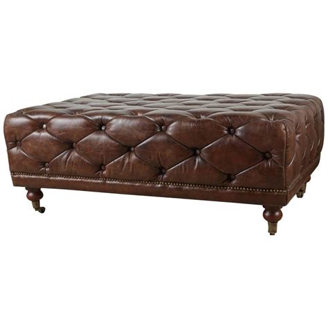 The oversized ottomans for your coffee tables are: Tufted Leather Ottoman and Coffee Table at 1stdibs