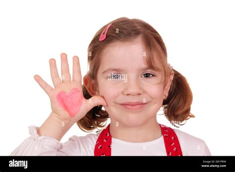 Happy Little Girl With Heart On Hand Stock Photo Alamy