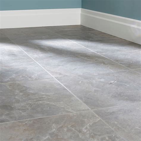 A flooring tile can create warmth underfoot by choosing the right colours, tones and texture, or act as a standout feature floor for entrances and smaller spaces to make them more exciting. Burlington Pebble Stone effect Ceramic Wall & floor tile ...
