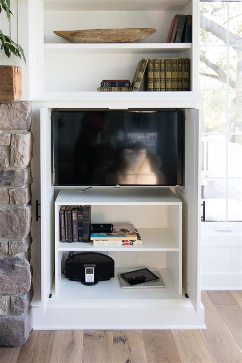 Or try a cabinet that a tv can be lowered. Friday Feels - Hidden TV Cabinet Built-ins - The Lilypad ...