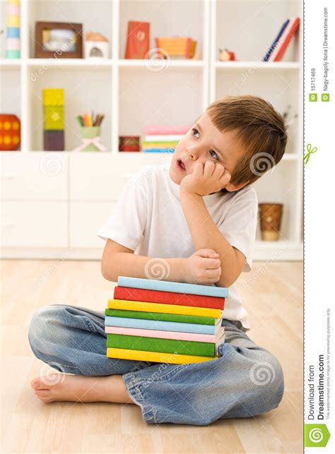 Bored Kid With Lots Of School Books Royalty Free Stock