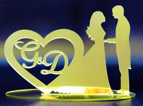 Topo de bolo casal com iniciais acrílico espelhado dourado Elo