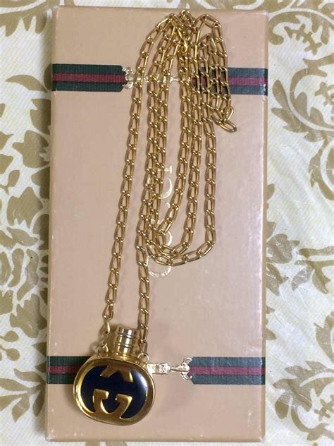 Vintage Gucci Gold And Navy Round Shape Perfume Bottle Necklace With
