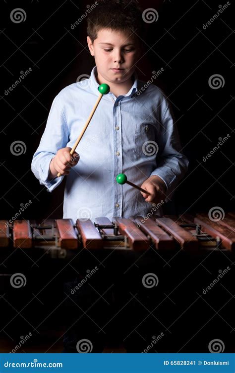 Boy Playing On Xylophone Stock Image Image Of Person 65828241
