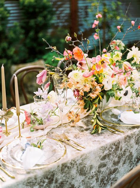With a lingering wintry dusk these soft shades of yellow, blue and grey somehow manage to be both stylishly. Glam spring garden wedding ideas - 100 Layer Cake