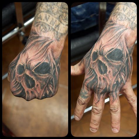 Skull Hand Tattoo Hand Tattoos For Guys Hand Tattoos Skull Hand Tattoo