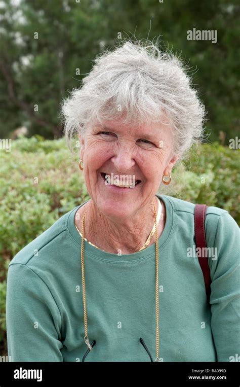 Portrait Of Happy Senior Woman Smiling Stock Photo Alamy