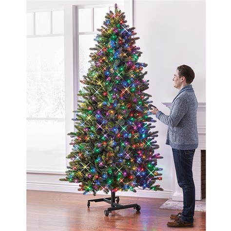 The Remote Controlled Height Adjustable Christmas Tree Hammacher