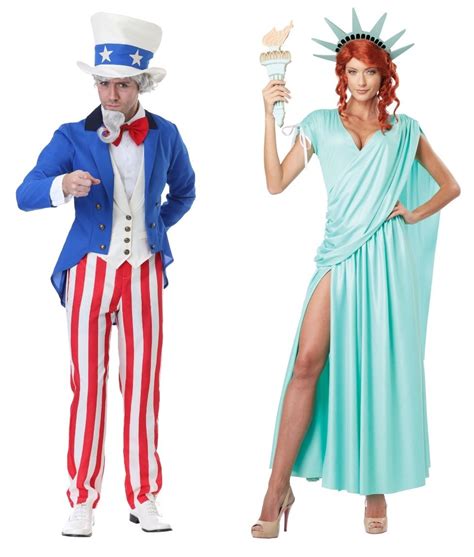 Two People Dressed As The Statue Of Liberty And Uncle Lincoln Are