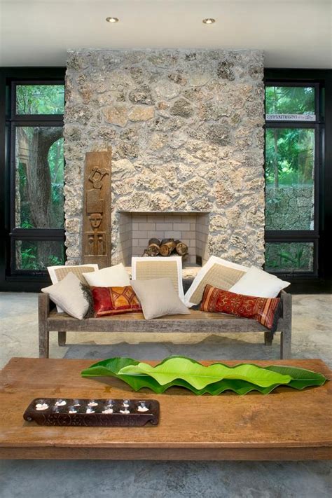 Neutral Tropical Living Room With Stone Fireplace Hgtv