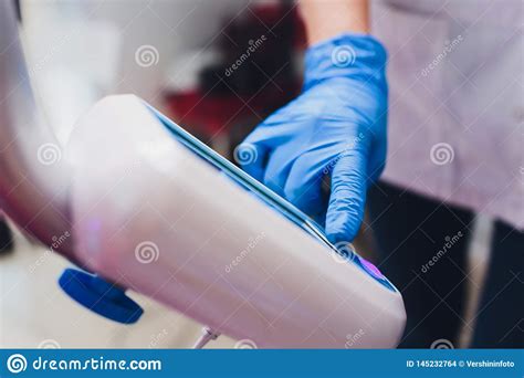 Dentist Curing Female Patient Woman Teeth Examined At Dentists Teeth