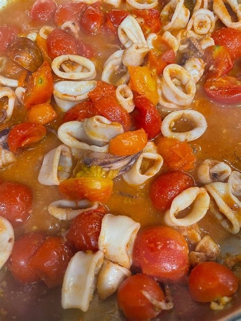 Italian Calamarata Pasta Calamari And Tomato Sauce Italian Kitchen