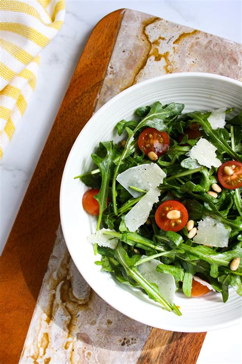Arugula Salad With Parmesan Cherry Tomatoes And Pine Nuts Cherries