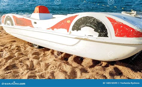 Beautiful Image Of Old Pedal Catamaran Boat Lying On The Sea Shore