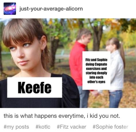 A Woman Is Standing In Front Of Two People And Has A Sign That Says Keefe
